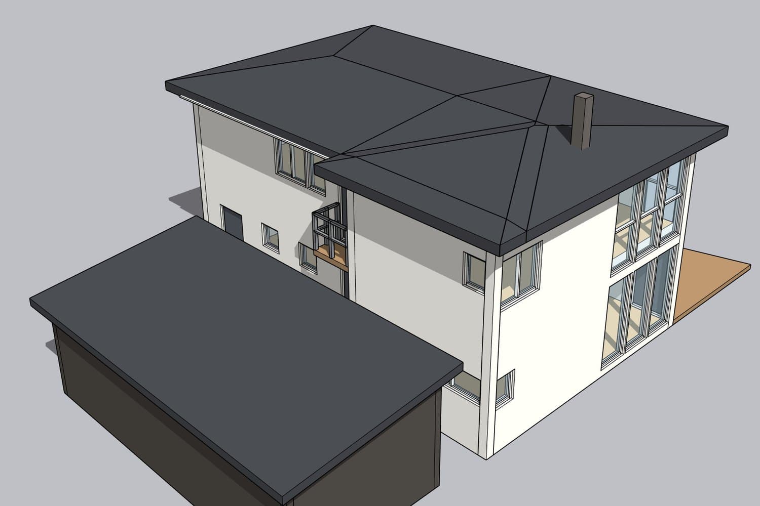The house from above at an angle, garage in the foreground